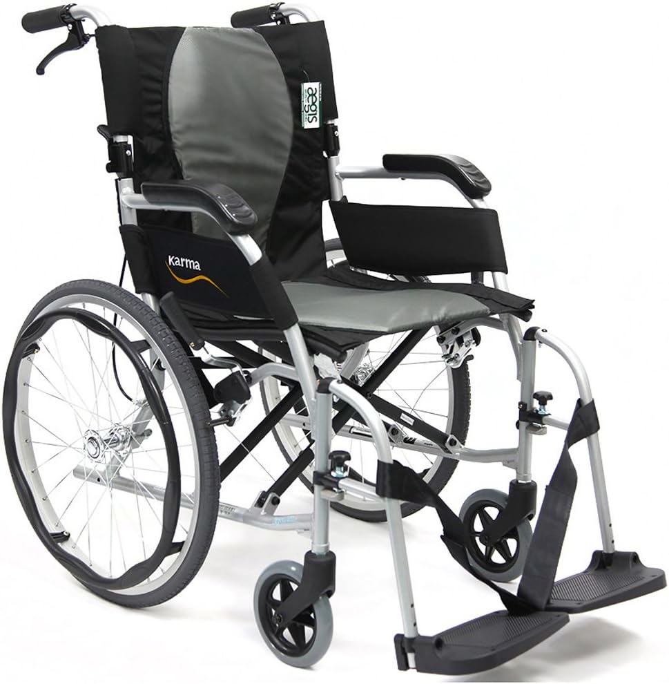 The Karman Ergo Flight Ultra Lightweight Ergonomic Wheelchair is a sleek black and gray model with armrests, footrests, large rear wheels, and smaller front ones. Its ergonomic design and foldable structure make it ideal for easy transport and long-term mobility needs.